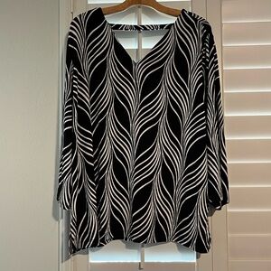 TRAVELERS BY CHICO’S - Elegant Black and White Women's Top. NWT.